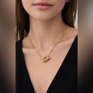 ✨ Nina Ricci Gold-plated Necklace with Pretzel Knot design & Crystal Detail.✨